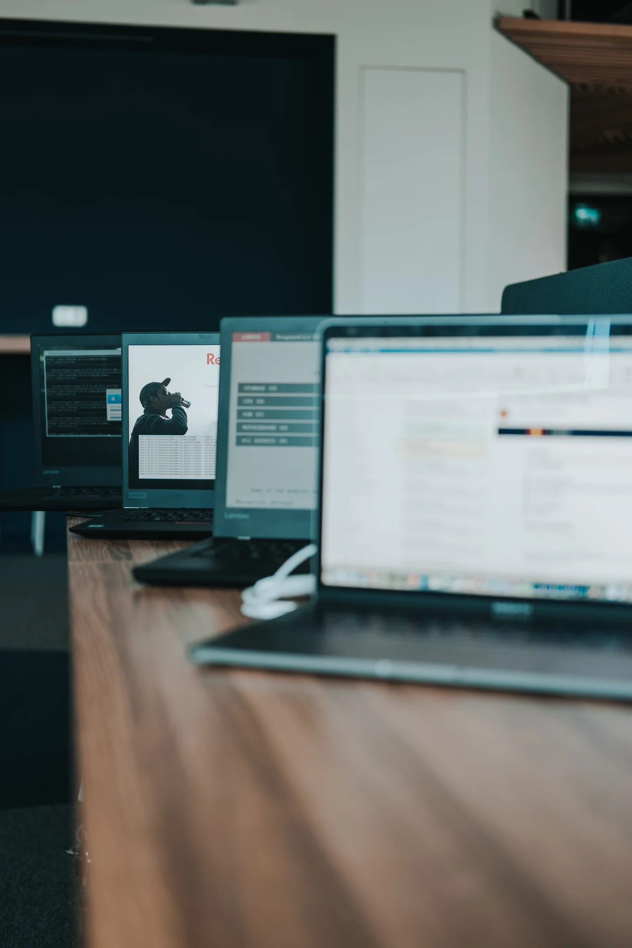 Used business laptops prepared for office refresh and company equipment clearance